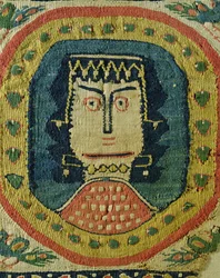 Weibliche Büste in einem Medaillon